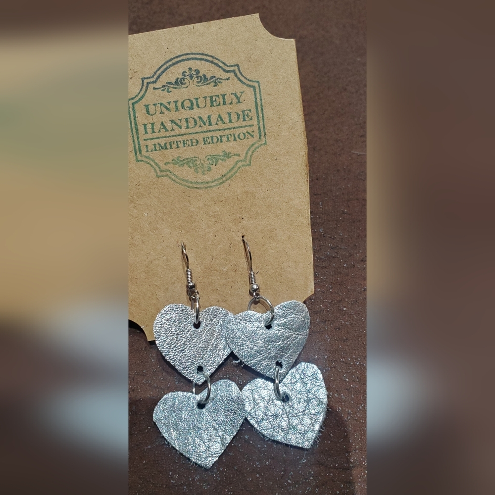 Silver heart leather earrings
